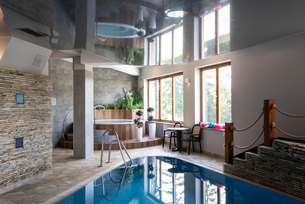 Apartament Rysy Apartamentyzakopianskie Basen Sauna Jacuzzi زاكوباني المظهر الخارجي الصورة